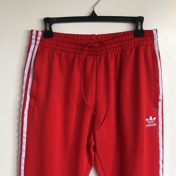 red and white adidas joggers